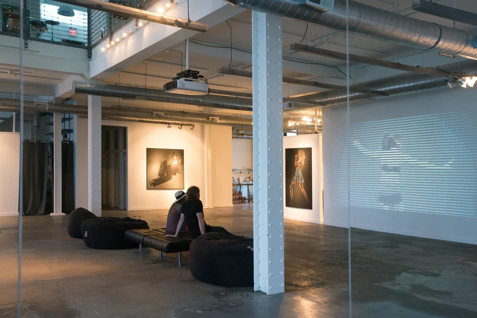 Visitors viewing the ASCII projection at Heron Arts. Photography by Daniel Fletcher.