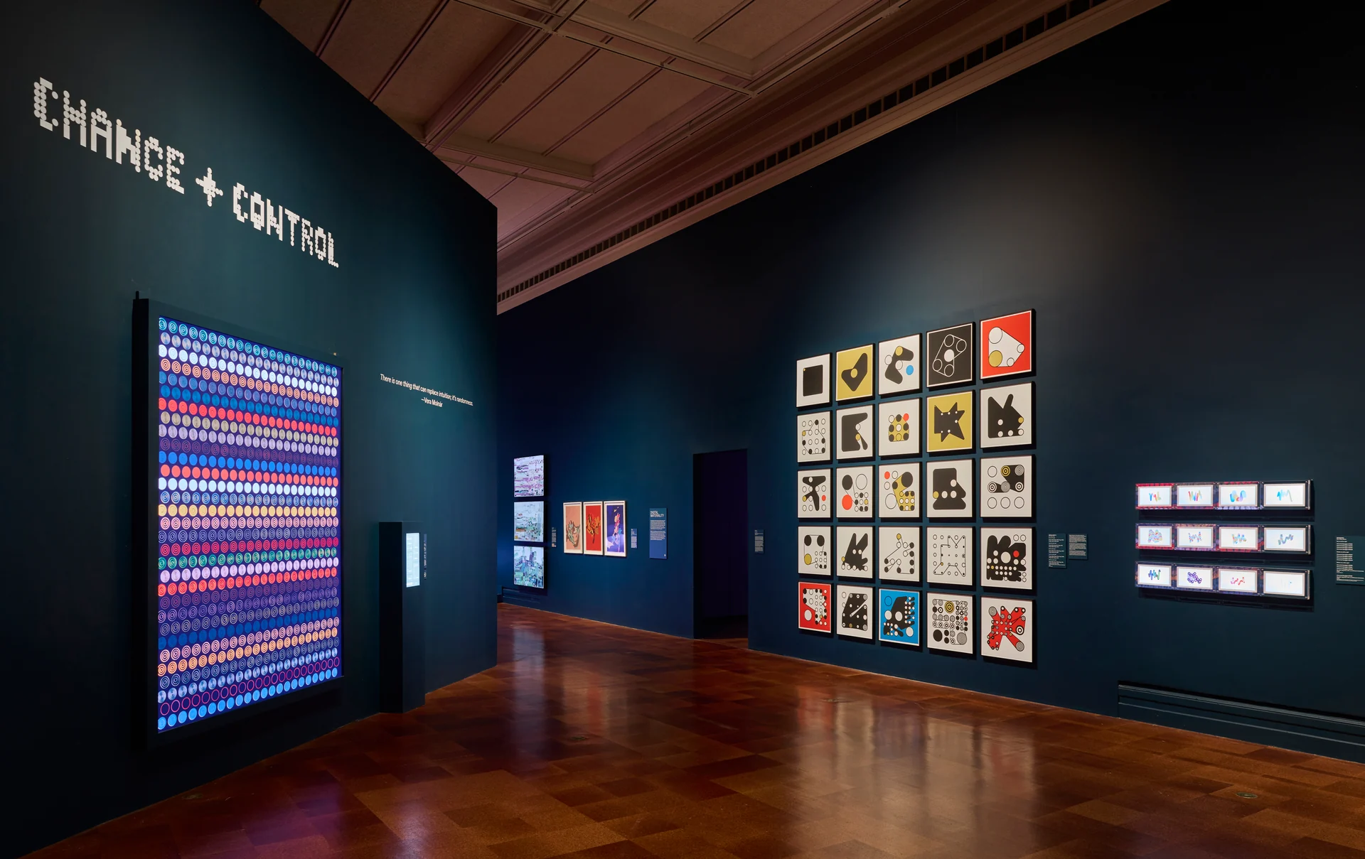 The Chance & Control gallery, with the Ringers print grid on the right wall.