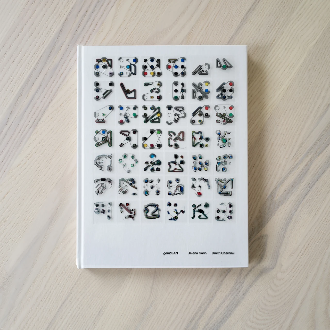 The gen2GAN book, with a grid of generative compositions and GAN outputs on its cover.